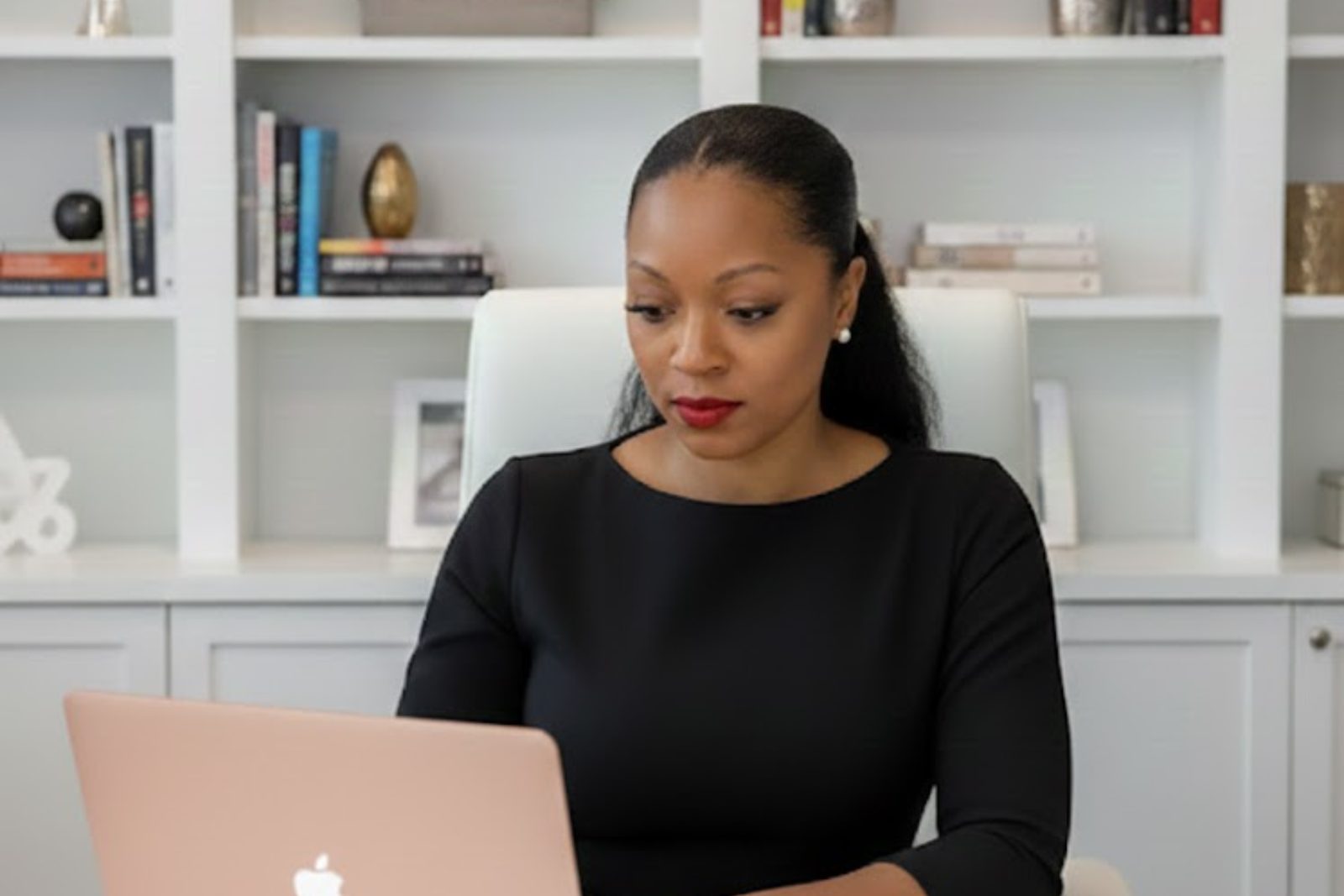 Dr. Tasha "TMac" McCray working at her desk